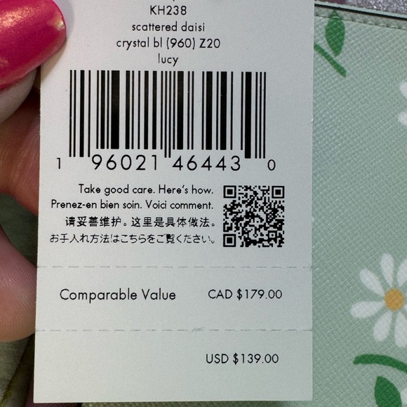 NWT Kate Spade Medium Lucy Scattered Daisi pattern wristlet - Picture 6 of 9